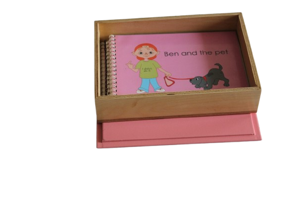 PINK STORY BOOK LETS (A WOODEN BOX WITH 6 INDIVIDUAL STORY BOOK LETS  PERTAINING TO "VOWEL SOUNDS A,E,I,O,U AND ONE MIXED VOWEL)